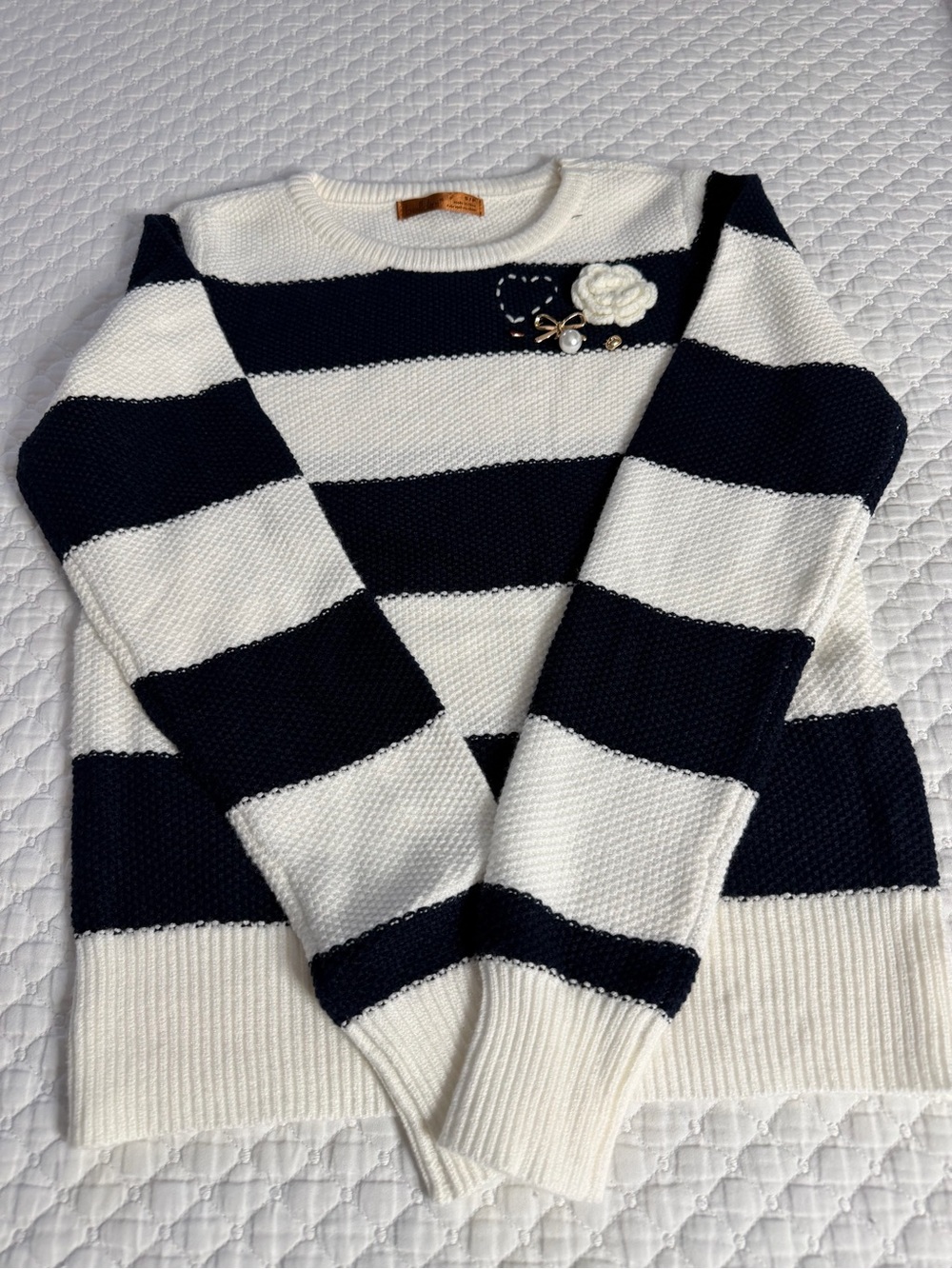 Striped Navy and White Crewneck Sweater with Floral Accent